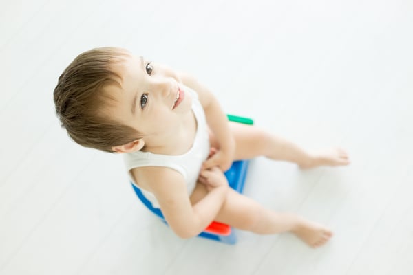 Cute little child at home toilet