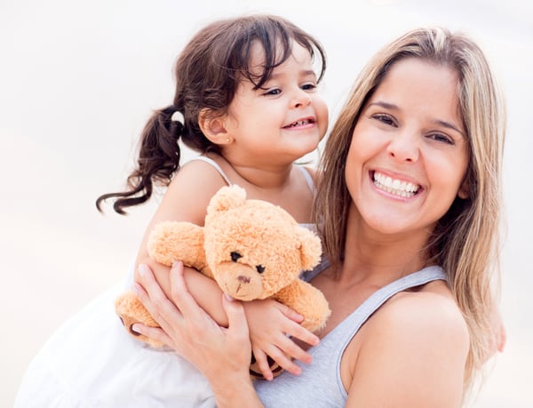 Mother and daughter portrait with a teddy bear-1