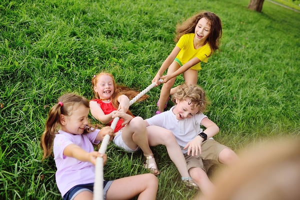 children playing tug of war