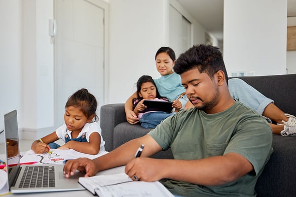 family of four in living room