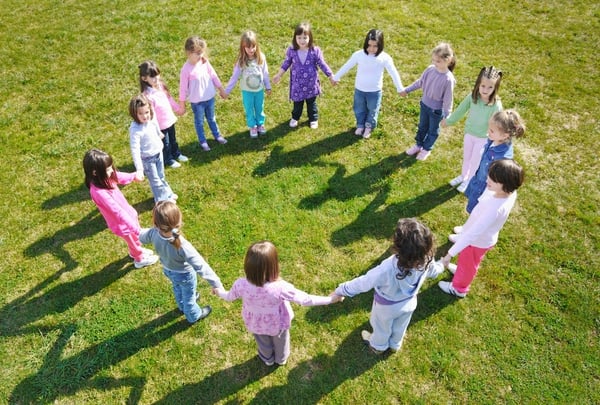 happy child kids group have fun and play at kindergarden outdoor preschool education concept with  teacher