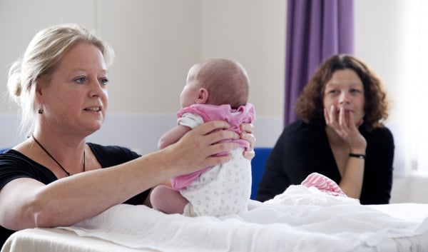 health visitor with baby